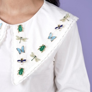 Pin's Papillon bleu Coucou...
